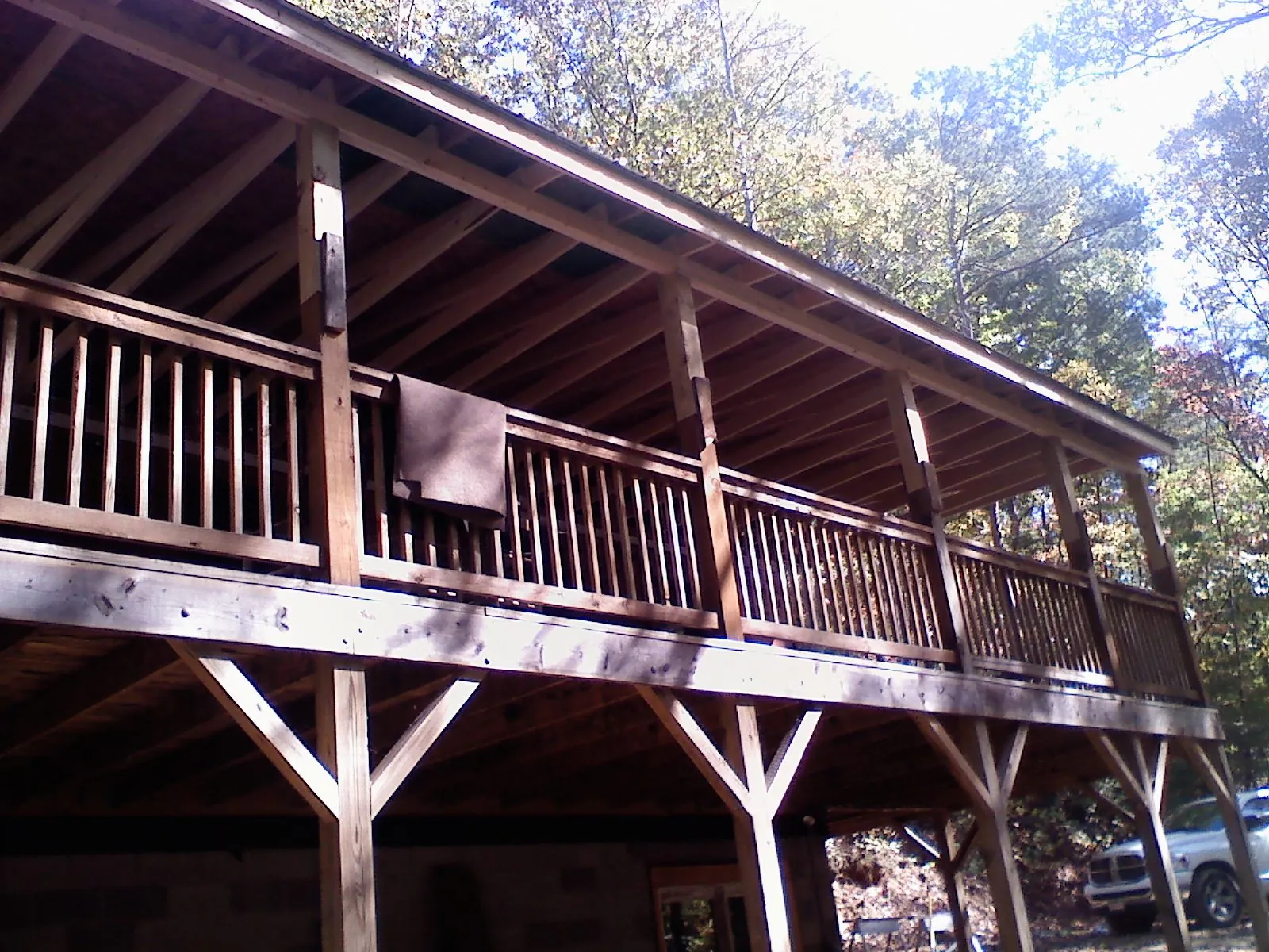 Timber framing under a new elevated porch and deck — Roof Leak Repair in Cypress Inn by Roofing Brothers
